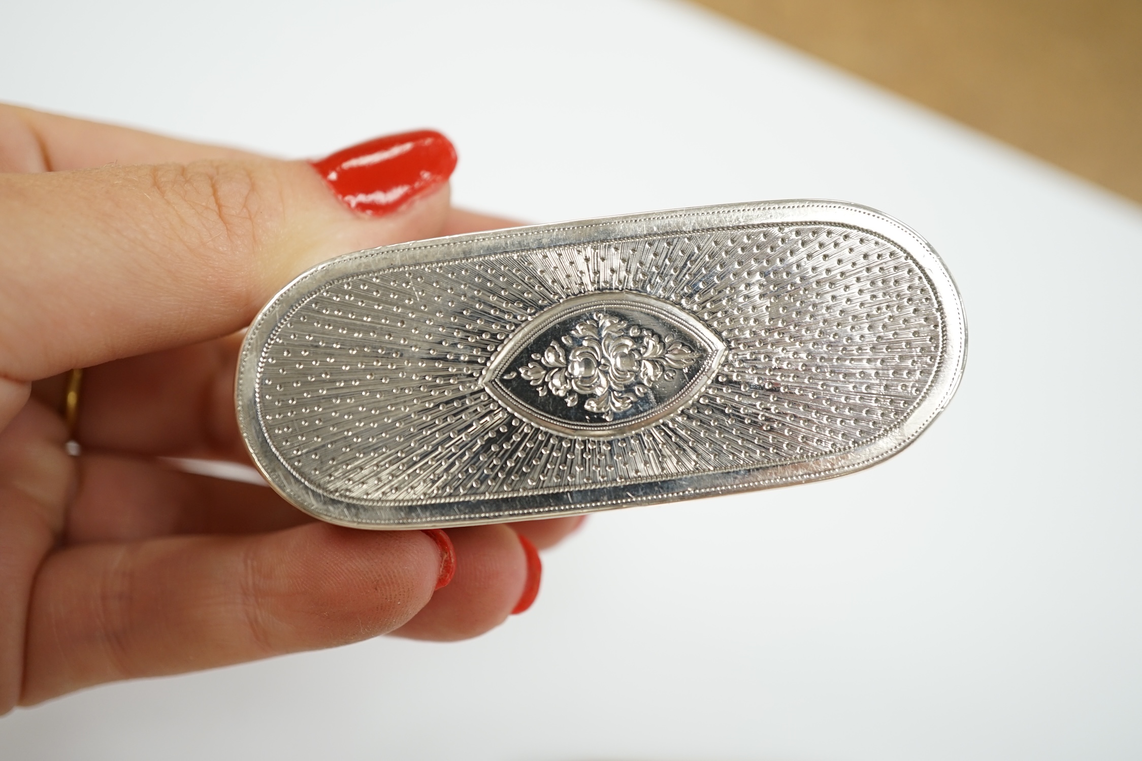 A George III engraved silver oval snuff box, by Phipps & Robinson, London, 1793, 70mm and one other Georgian silver snuff box.